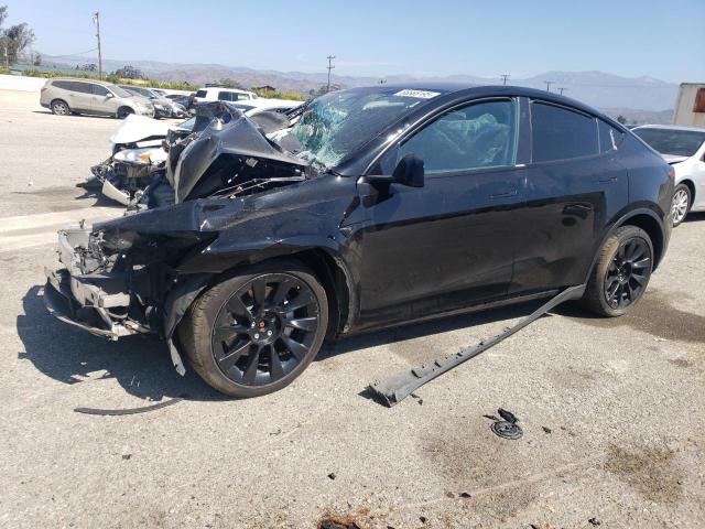 TESLA MODEL Y 2024 with VIN 7SAYGDEE9RA214851 - Photo from auction