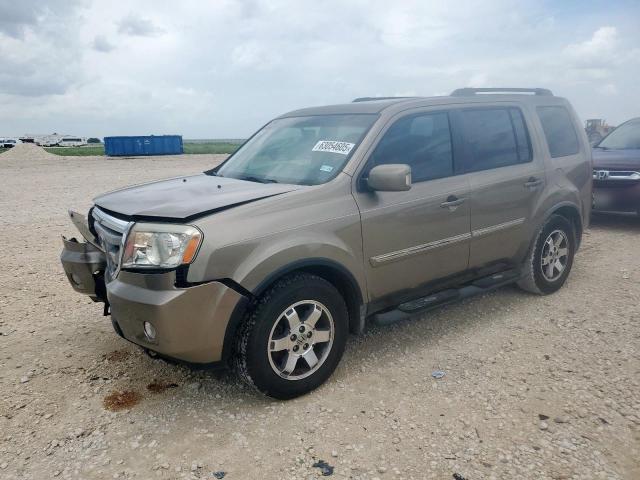 HONDA PILOT TOUR 2011 with VIN 5FNYF3H90BB038421 - Photo from auction