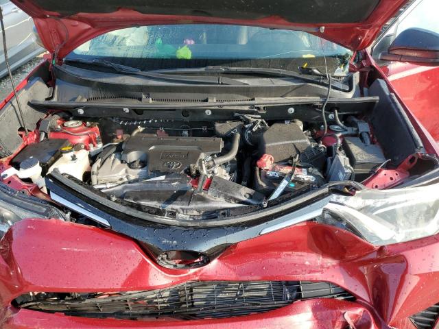 Photo 12 from auction – 2018 TOYOTA RAV4 LE with VIN 2T3BFREV9JW749764