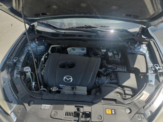 Photo 11 from auction – 2016 MAZDA CX-5 TOURING with VIN JM3KE2CY4G0676279