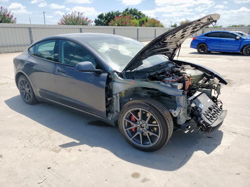 Photo 4 from auction – 2022 TESLA MODEL 3 with VIN 5YJ3E1EB2NF184252