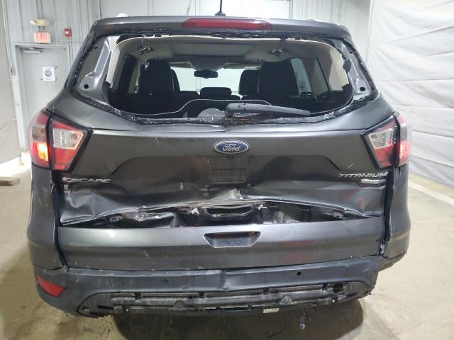 Foto 6 de la subasta – 2017 FORD ESCAPE TIT con VIN 1FMCU9JD2HUD32383