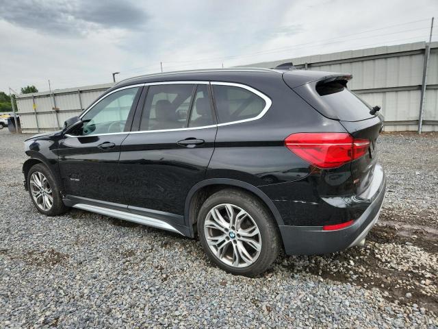 Photo 2 from auction – 2017 BMW X1 XDRIVE2 with VIN WBXHT3C32H5F75352