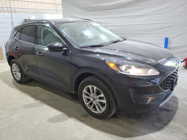 Photo 4 from auction – 2021 FORD ESCAPE SE with VIN 1FMCU9G65MUB29457