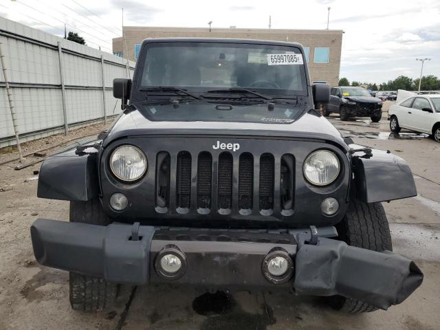 Photo 5 from auction – 2014 JEEP WRANGLER U with VIN 1C4BJWEG2EL103408