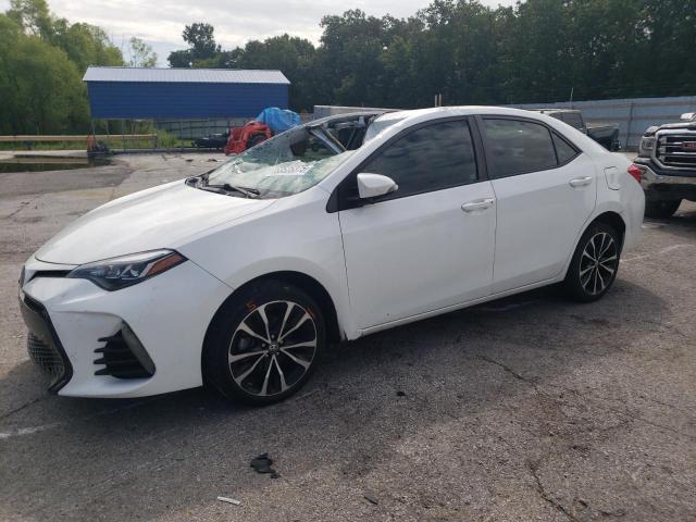 TOYOTA COROLLA L 2017 with VIN 5YFBURHE8HP697758 - Photo from auction