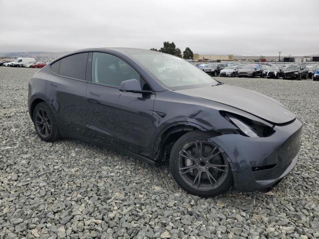 Photo 4 from auction – 2025 TESLA MODEL Y with VIN 7SAYGDED9SF316327