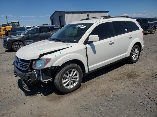 DODGE JOURNEY SX 2014 with VIN 3C4PDDBGXET251543 - Photo from auction