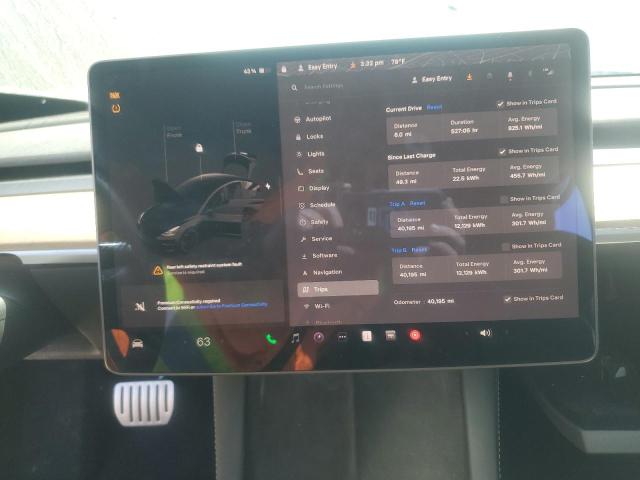 Photo 9 from auction – 2022 TESLA MODEL 3 with VIN 5YJ3E1ECXNF177977