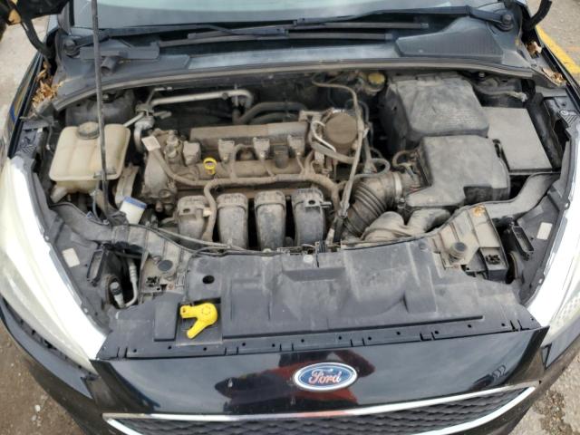 Photo 11 from auction – 2016 FORD FOCUS with VIN 1FADP3E22GL211014