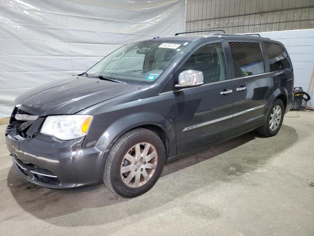 CHRYSLER TOWN & COU 2011 with VIN 2A4RR8DG5BR676854 - Photo from auction