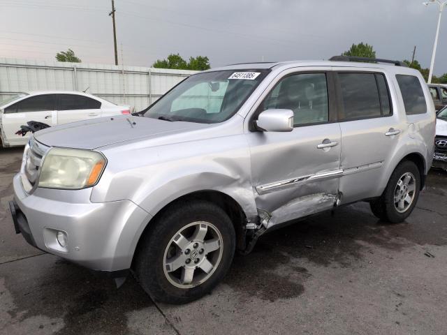 HONDA PILOT TOUR 2011 with VIN 5FNYF4H90BB058755 - Photo from auction