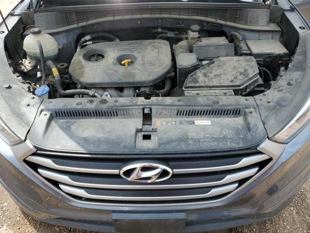 Photo 12 from auction – 2018 HYUNDAI TUCSON SE with VIN KM8J2CA45JU672546