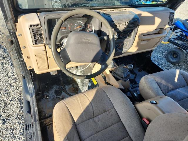 Photo 8 from auction – 2002 JEEP WRANGLER SPO with VIN 1J4FA49S62P749862