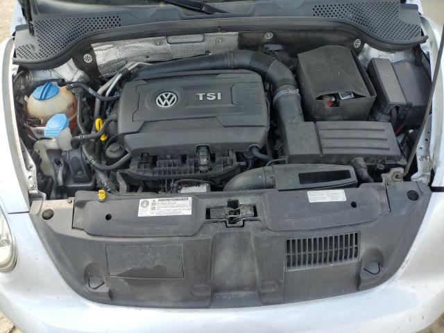 Photo 11 from auction – 2014 VOLKSWAGEN BEETLE with VIN 3VWF17AT9EM643554