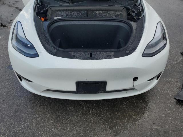 Photo 12 from auction – 2023 TESLA MODEL Y with VIN 7SAYGDEF2PF831923
