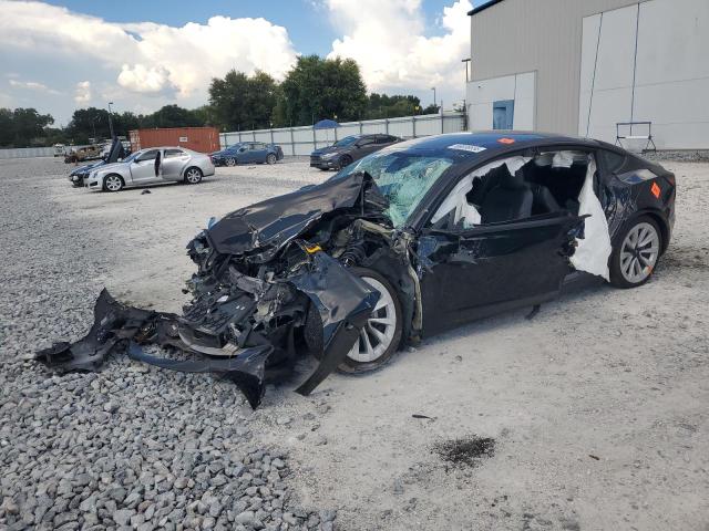 TESLA MODEL 3 2022 with VIN 5YJ3E1EB5NF201495 - Photo from auction