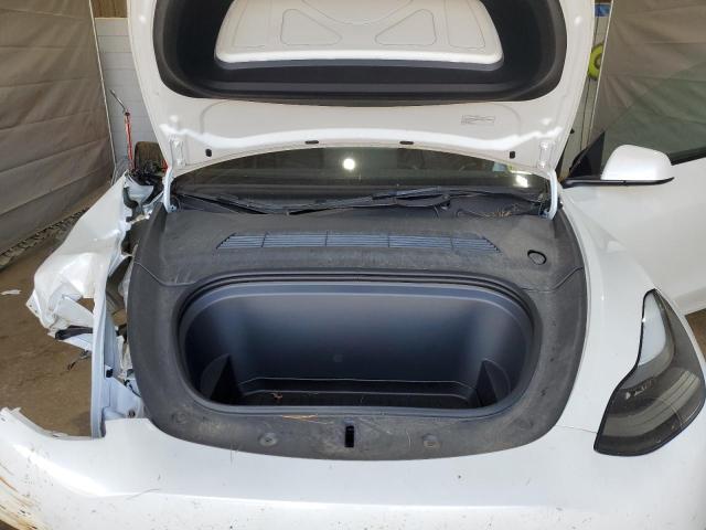 Photo 11 from auction – 2023 TESLA MODEL Y with VIN 7SAYGDEE4PF666836