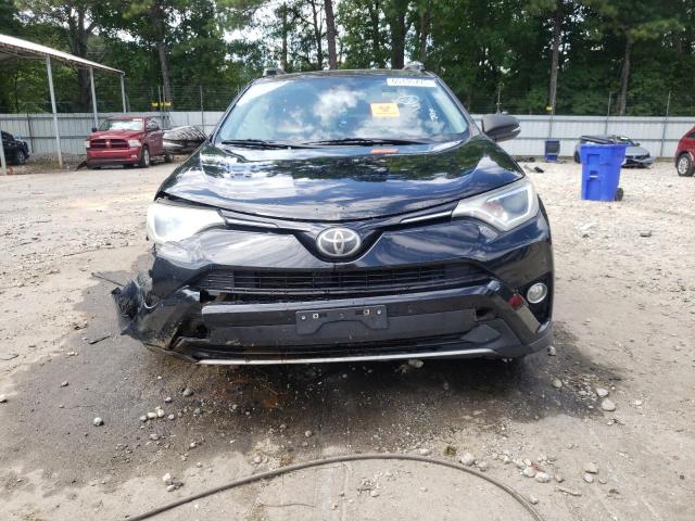 Photo 5 from auction – 2017 TOYOTA RAV4 XLE with VIN 2T3RFREV1HW659680