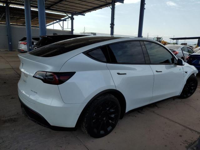 Photo 3 from auction – 2021 TESLA MODEL Y with VIN 5YJYGDEE9MF153395
