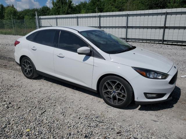 Photo 4 from auction – 2018 FORD FOCUS SE with VIN 1FADP3FE0JL201551