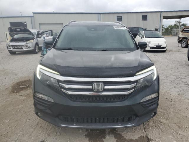 Photo 5 from auction – 2016 HONDA PILOT TOUR with VIN 5FNYF5H97GB002020