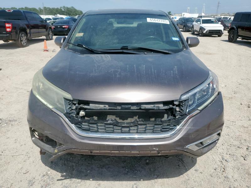 Photo 5 from auction – 2015 HONDA CR-V with VIN 3CZRM3H54FG702415