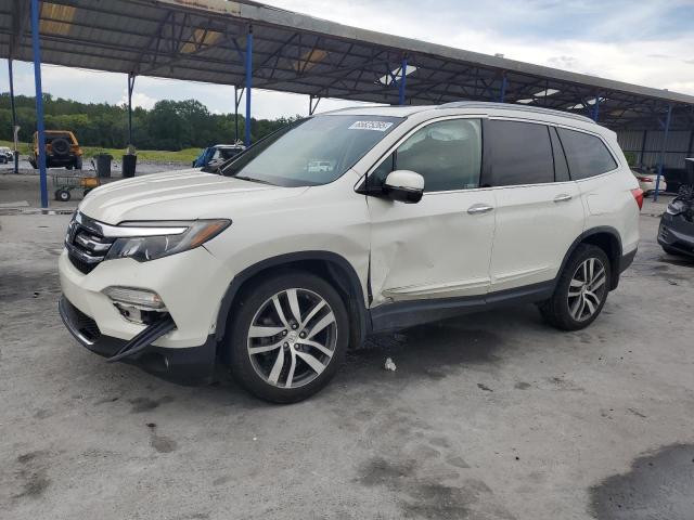 HONDA PILOT TOUR 2018 with VIN 5FNYF6H93JB041040 - Photo from auction