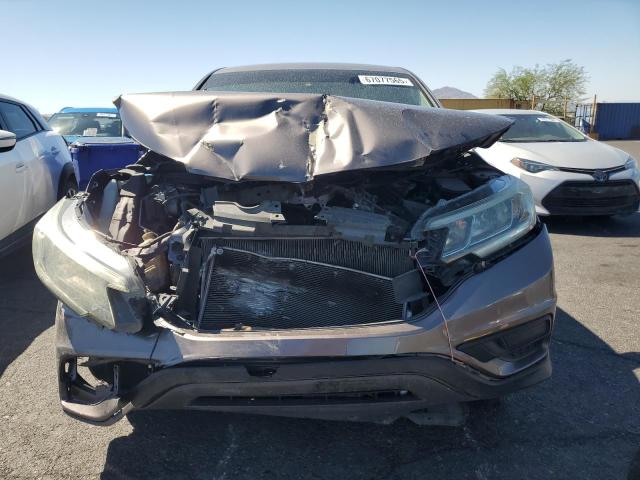 Photo 5 from auction – 2015 HONDA CR-V with VIN 3CZRM3H37FG707638