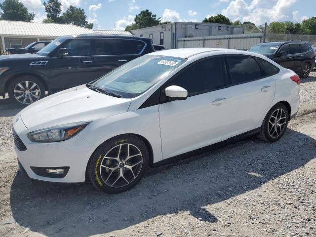 FORD FOCUS SE 2018 with VIN 1FADP3FE0JL201551 - Photo from auction