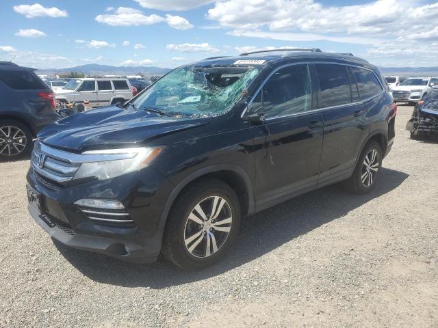 HONDA PILOT EXL 2016 with VIN 5FNYF6H87GB064854 - Photo from auction