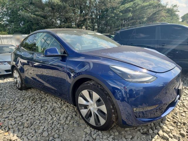 Photo 4 from auction – 2023 TESLA MODEL Y with VIN 7SAYGAEE8PF791353