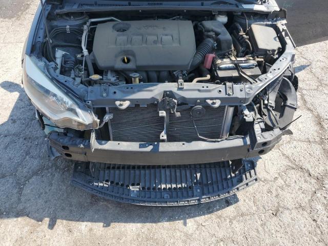 Photo 11 from auction – 2014 TOYOTA COROLLA L with VIN 2T1BURHE7EC057326