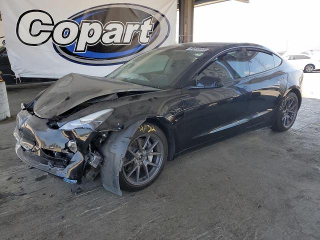 TESLA MODEL 3 2021 with VIN 5YJ3E1EB9MF877155 - Photo from auction