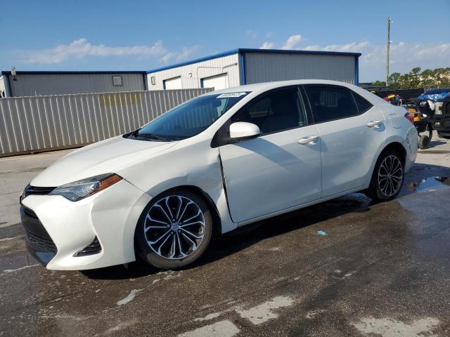 TOYOTA COROLLA L 2018 with VIN 5YFBURHE0JP744853 - Photo from auction
