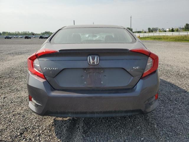 Photo 6 from auction – 2018 HONDA CIVIC LX with VIN 2HGFC2F69JH019833