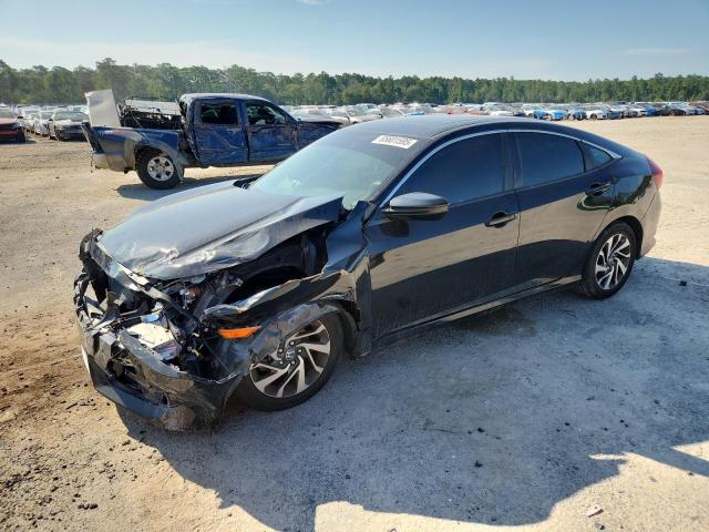 HONDA CIVIC EX 2017 with VIN 19XFC2F76HE065844 - Photo from auction
