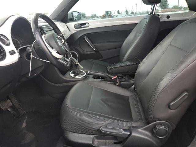 Photo 7 from auction – 2014 VOLKSWAGEN BEETLE with VIN 3VW5P7AT1EM802710