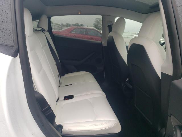 Photo 10 from auction – 2023 TESLA MODEL Y with VIN 7SAYGAEE5PF662857