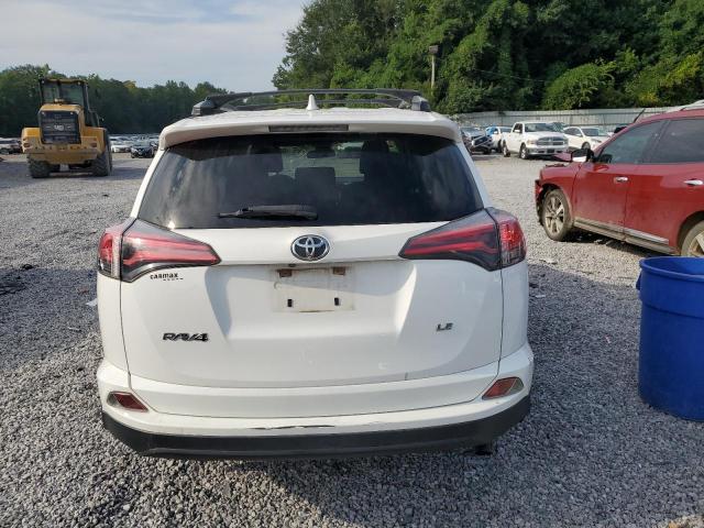 Photo 6 from auction – 2018 TOYOTA RAV4 LE with VIN JTMZFREV9JJ210977