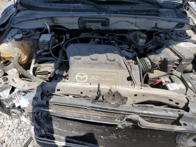 Photo 12 from auction – 2004 MAZDA TRIBUTE LX with VIN 4F2YZ94154KM20119