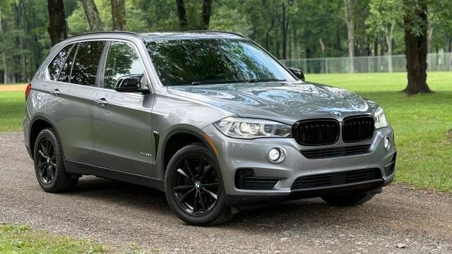 BMW X5 XDRIVE3 2015 with VIN 5UXKS4C54F0J98123 - Photo from auction