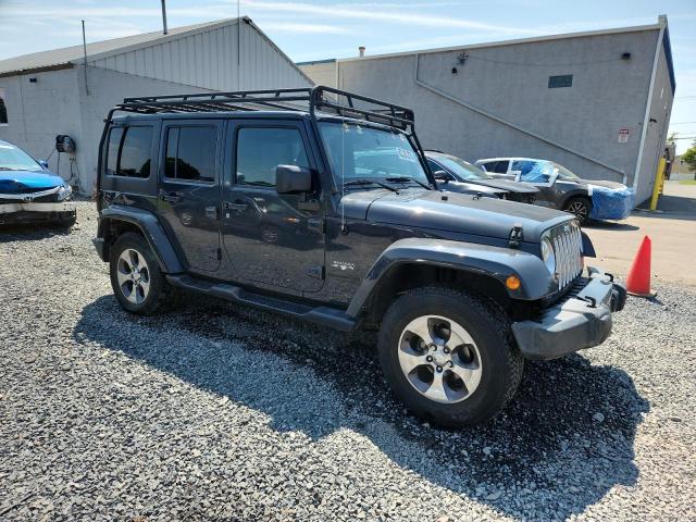 Photo 4 from auction – 2016 JEEP WRANGLER U with VIN 1C4BJWEG2GL288756