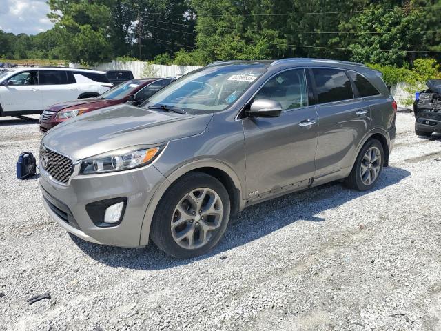 KIA SORENTO SX 2016 with VIN 5XYPKDA5XGG141561 - Photo from auction
