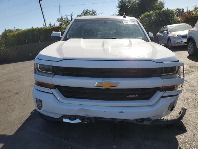 Photo 5 from auction – 2018 CHEVROLET SILVERADO with VIN 3GCUKRECXJG459343