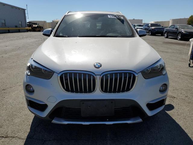 Photo 5 from auction – 2018 BMW X1 XDRIVE2 with VIN WBXHT3C37J5F90497