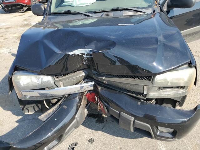 Photo 12 from auction – 2004 CHEVROLET TRAILBLAZE with VIN 1GNET16S946227628