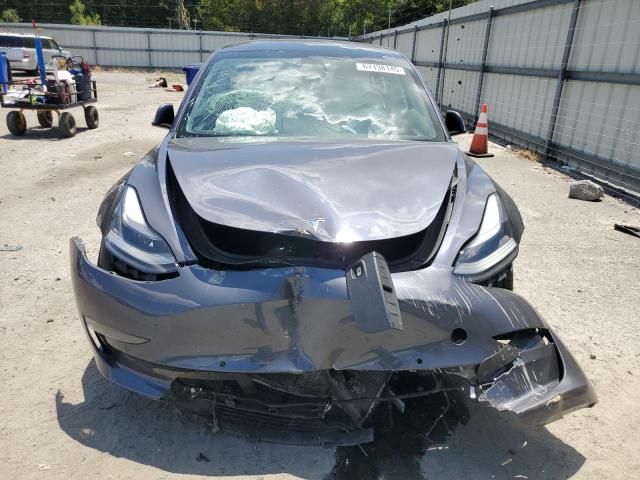 Photo 5 from auction – 2021 TESLA MODEL 3 with VIN 5YJ3E1EA0MF028815