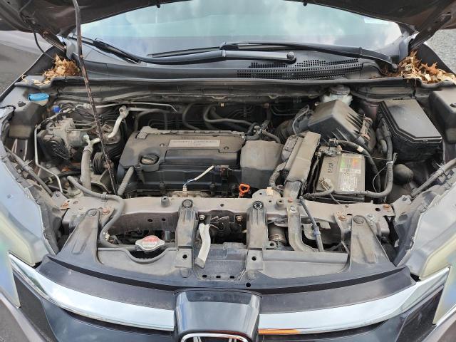 Photo 12 from auction – 2015 HONDA CR-V LX with VIN 5J6RM4H37FL013847