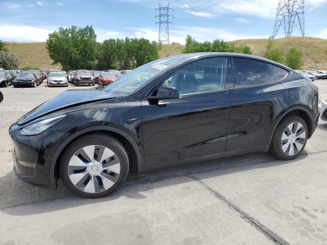 TESLA MODEL Y 2023 with VIN 7SAYGDEE0PA144864 - Photo from auction
